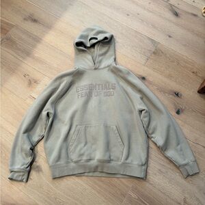 tan fear of god; essentials hoodie